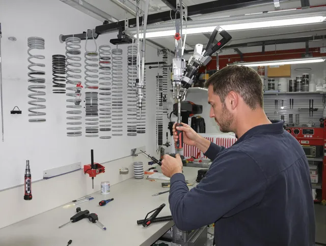 Clinton Garage Door Repair safety certified technician performing precision spring replacement in Clinton
